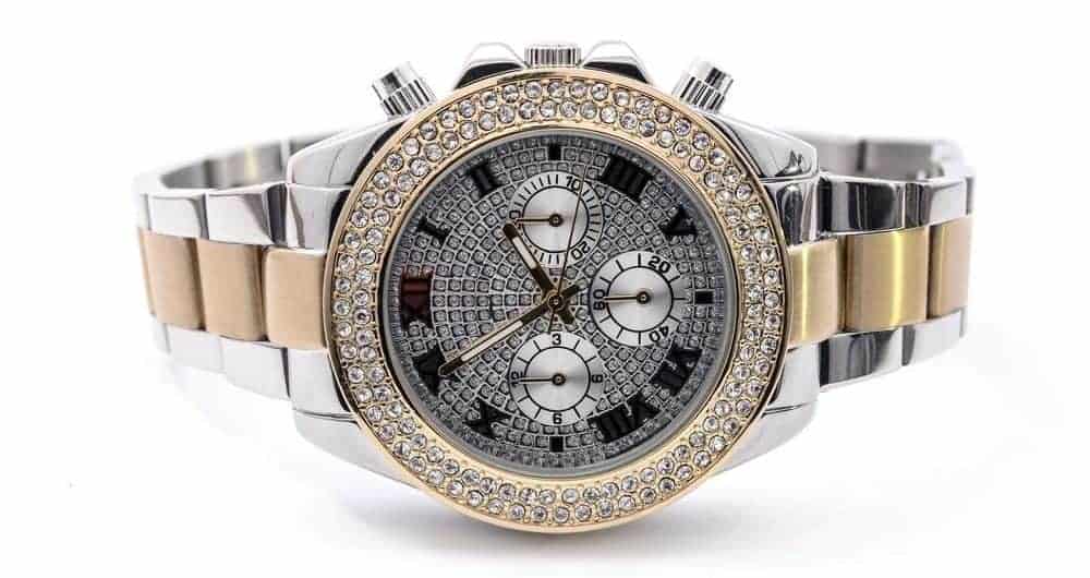 Luxury watch in two tone with diamond bezel.