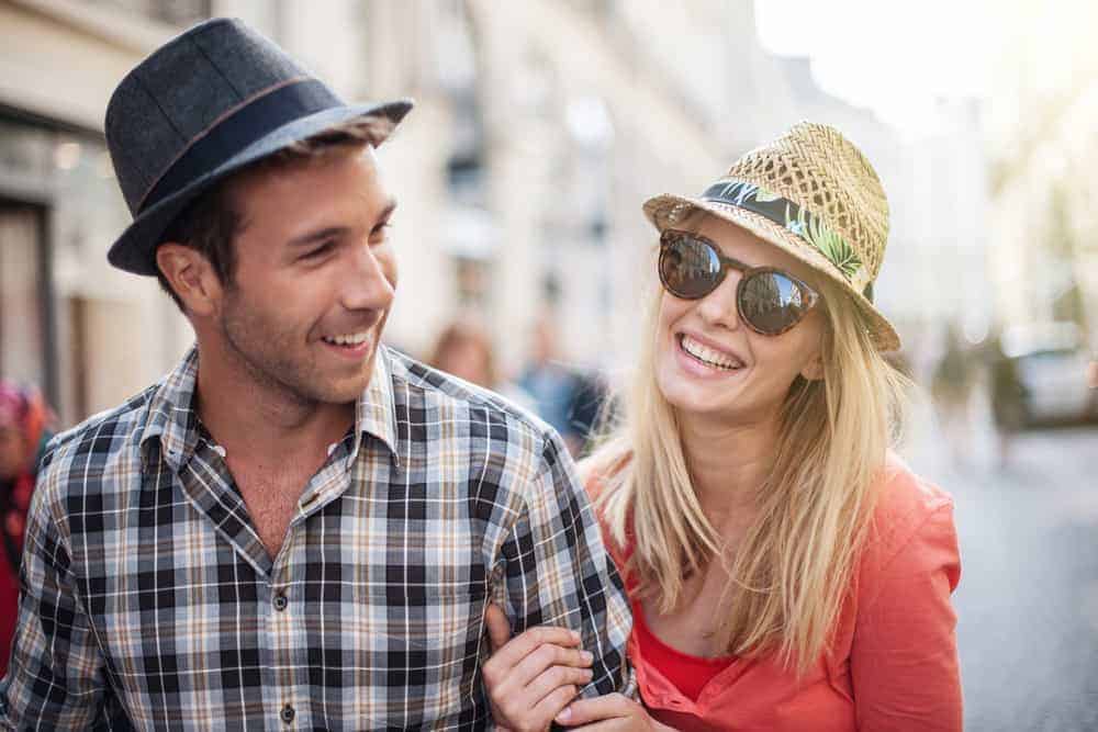 Man and woman wearing hats