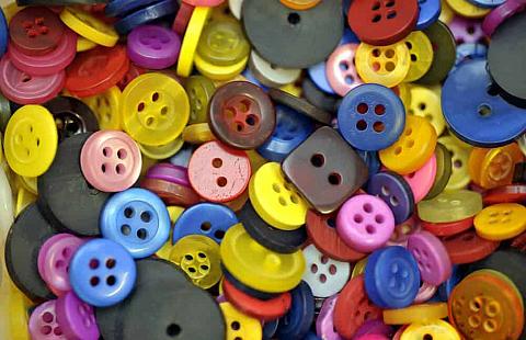 A close look at a bunch of colorful buttons.