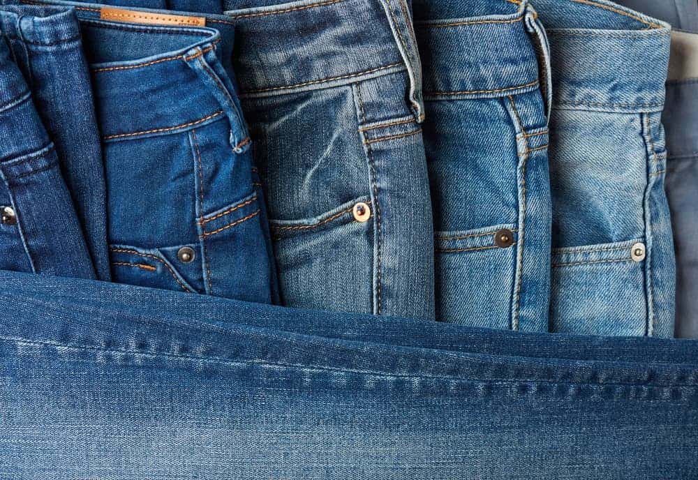 A close look at a variety of jeans.