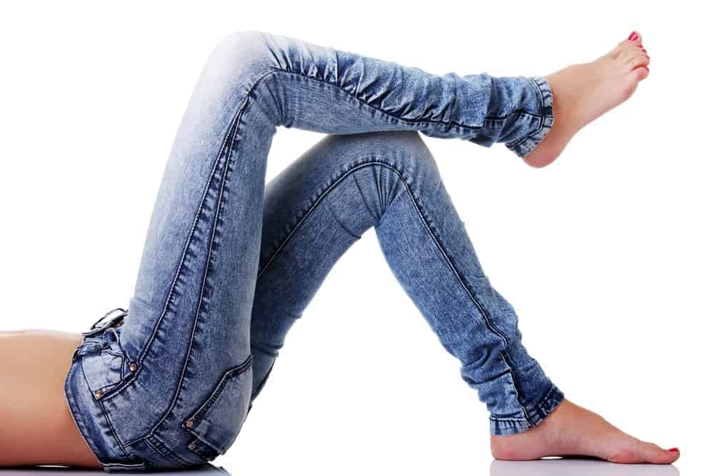 A woman wearing a pair of skinny jeans.