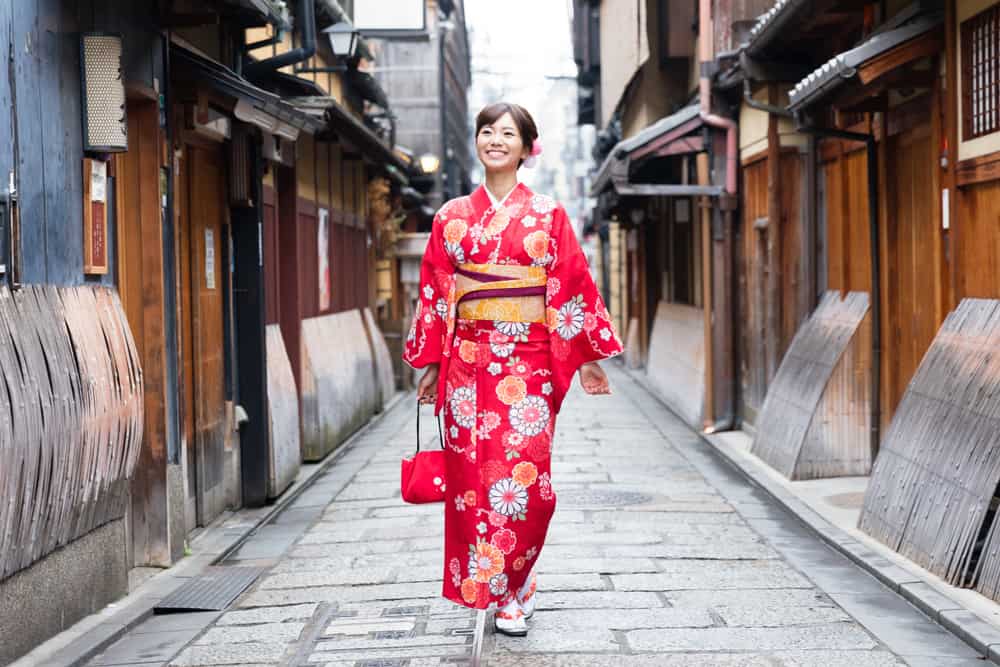 Japanese woman wearing a traditional kimono dress.