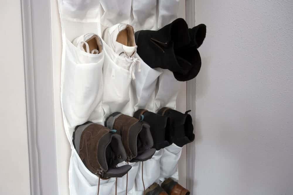 A close look at a set of shoe hangers for storing shoes.