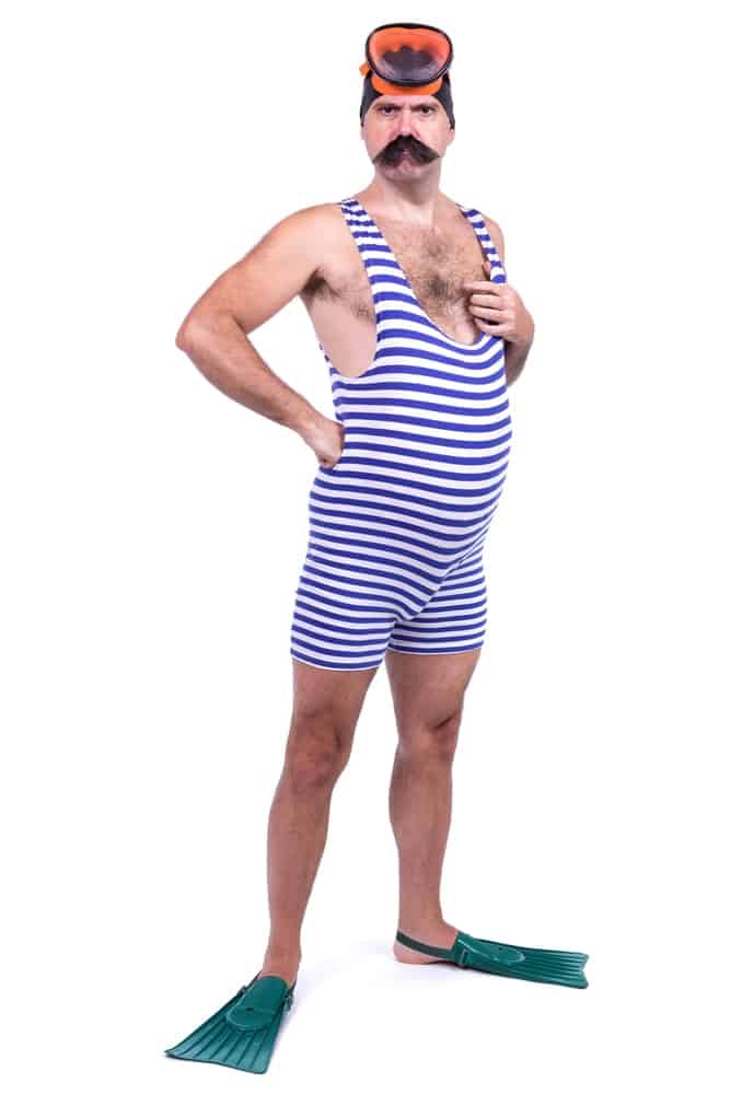 A man wearing vintage striped bathing suit.