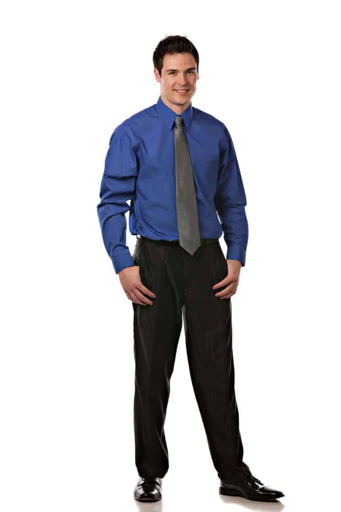 A man wearing dress pants with his office attire.