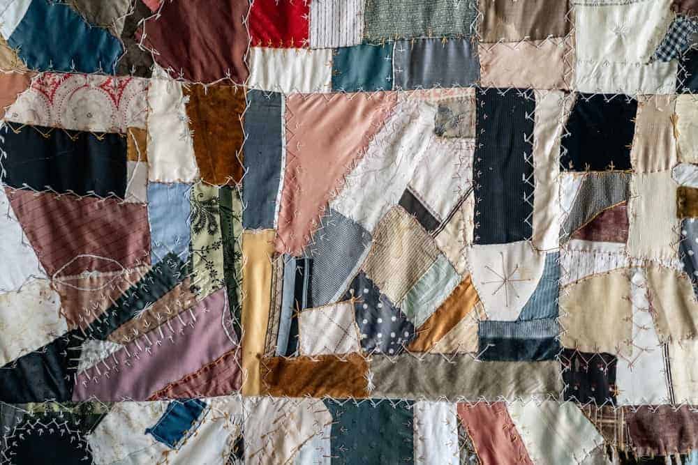 A close look at a colorful scrap quilt.