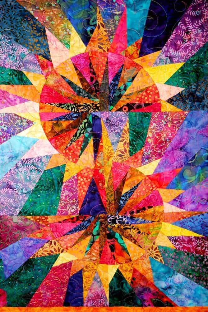 A full look at the artistic colorful quilt.