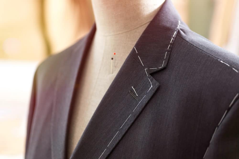 A close look at a suit with Basting/Tacking Stitch.