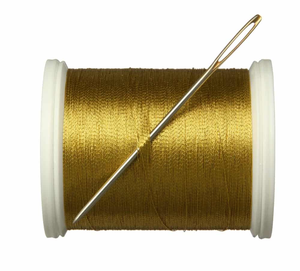 A spool of metallic thread.