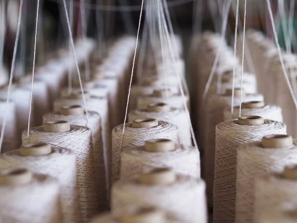 A close look at spools of textile threads.
