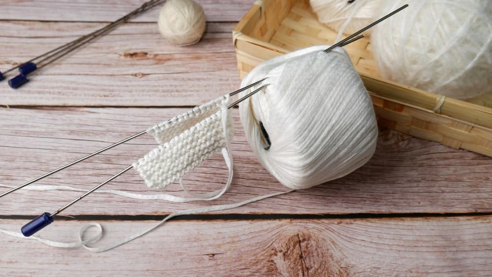A ball of white bamboo yarn.