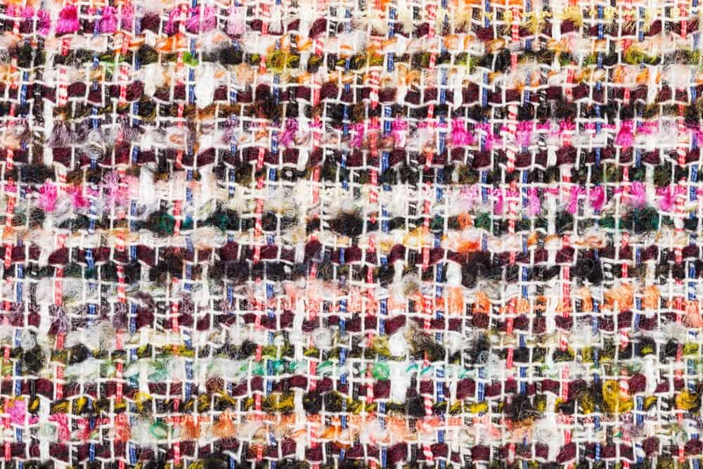 A close look at a colorful Bouclé yarn cloth.