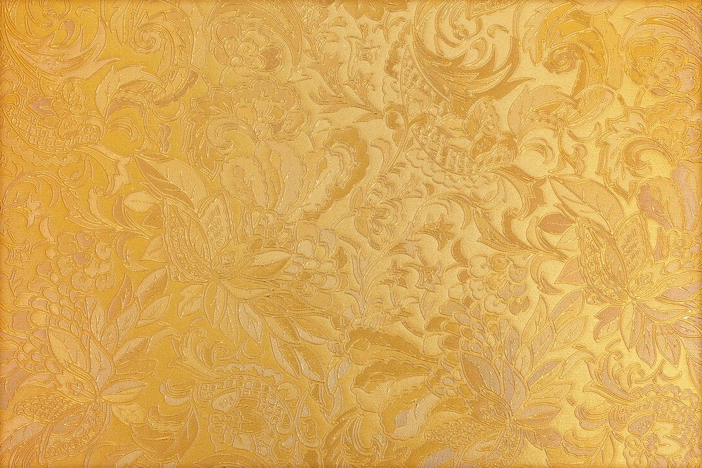 Gold textile with brocade texture