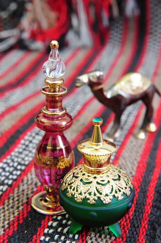 Egyptian perfume bottles on a hand-woven Omani rug.
