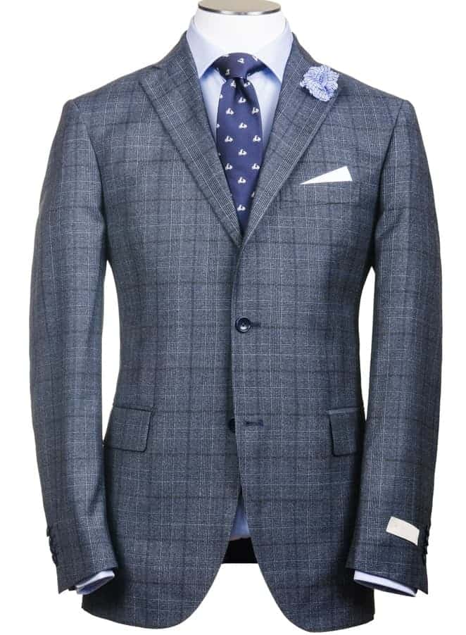 This is a close look at a patterned suit with tailored sleeves.