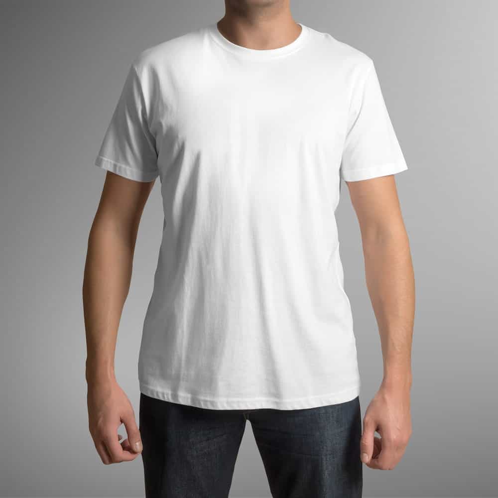 This is a close look at a man wearing a white crew neck undershirt.