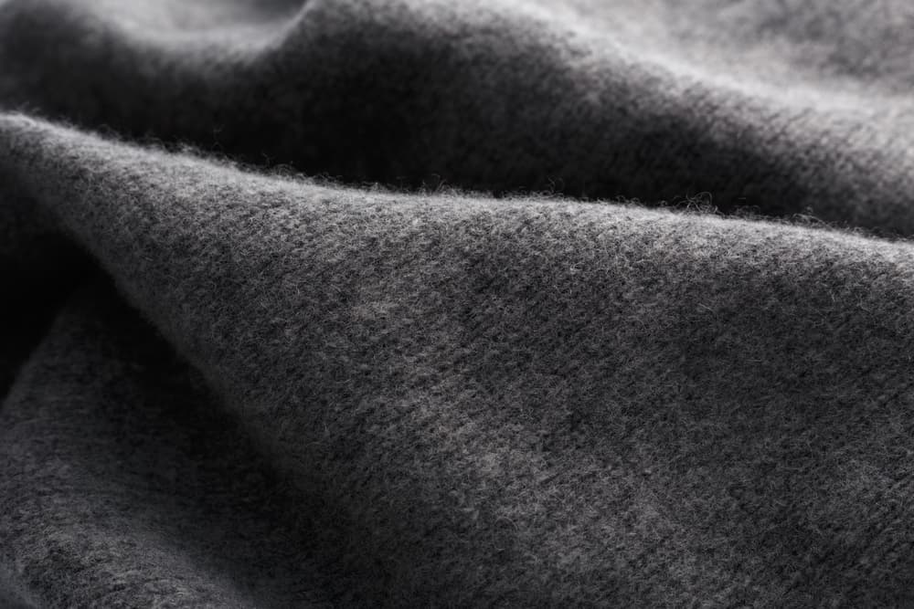 Close-up of a gray wool fabric.