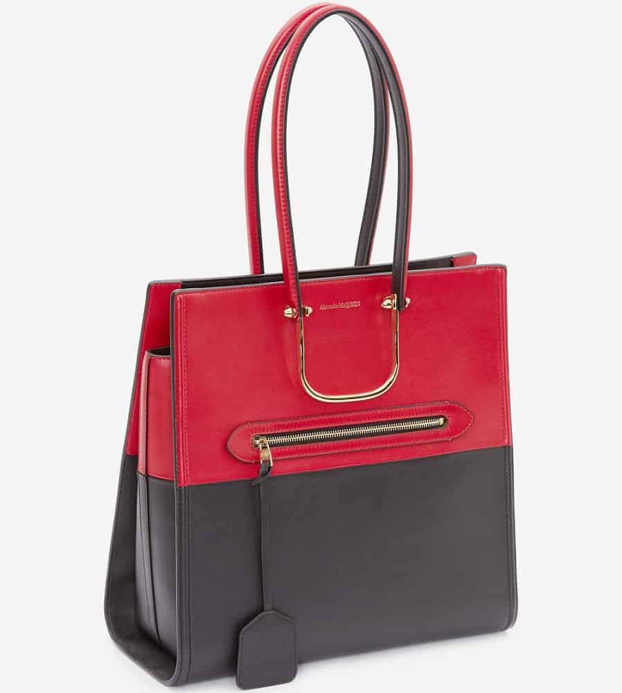 The Tall Story handbag in black and Welsh red from Alexander McQueen.