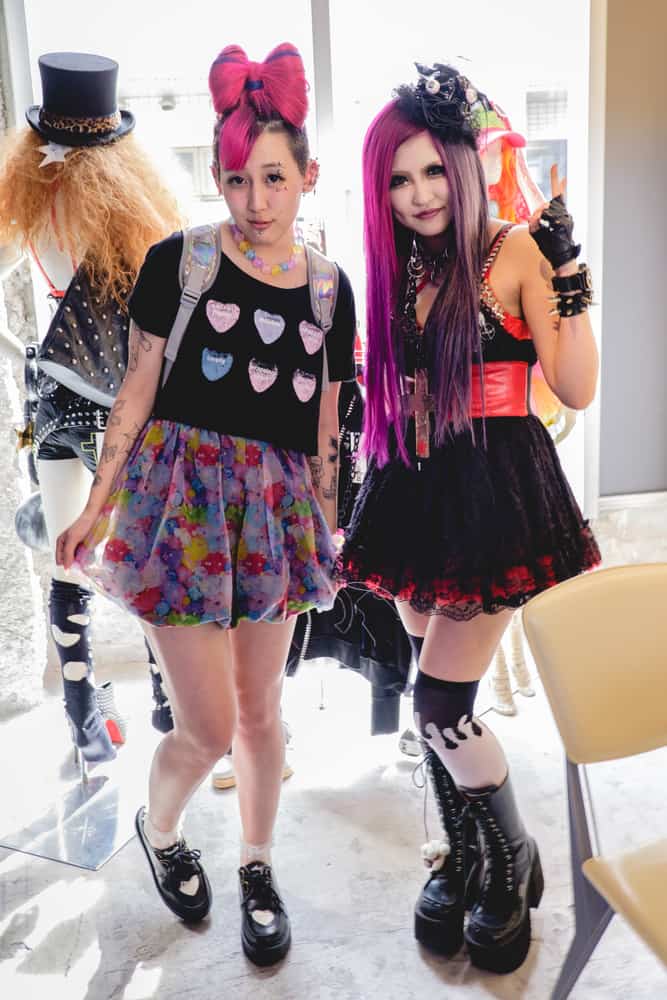Japanese girls wearing lolita outfits.
