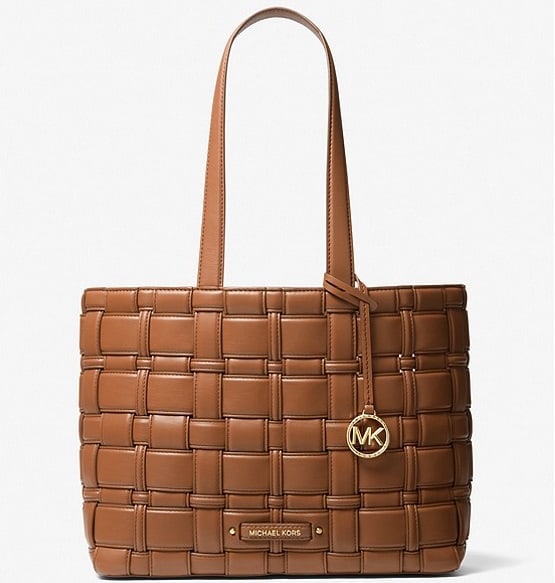 The brown Ivy Medium Woven Tote Bag from Michael Kors.