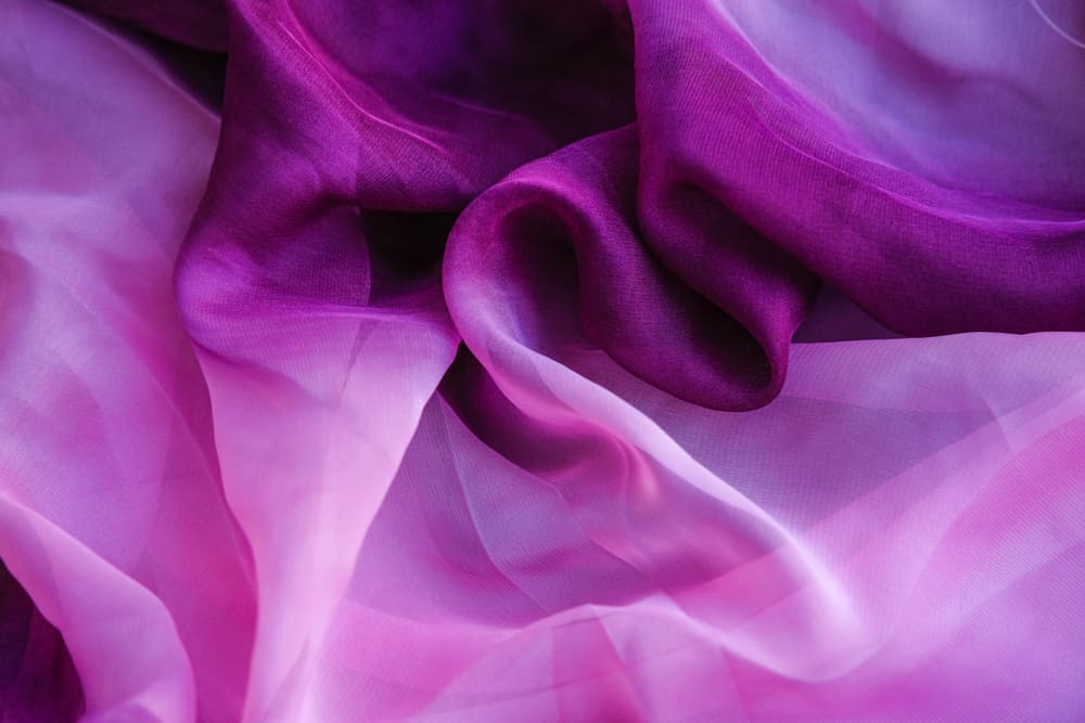 This is a close look at a purple Chiffon fabric.