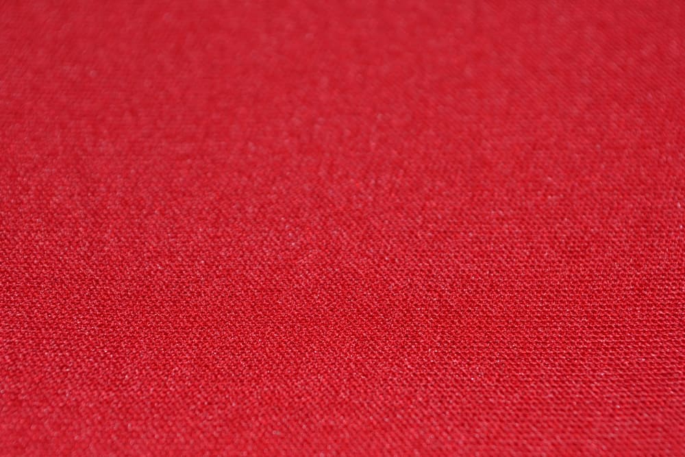 This is a close look at a bright red Neoprene fabric.