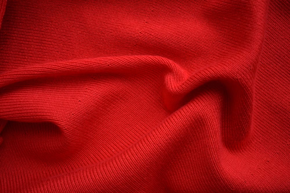 This is a close look at a red acrylic fabric.