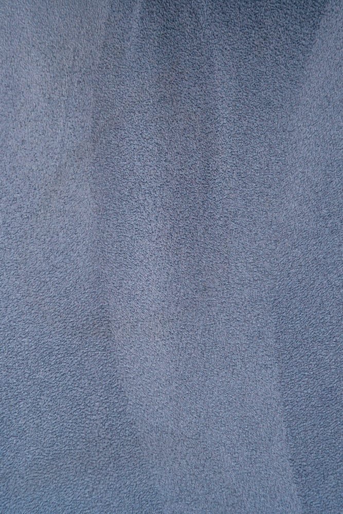 This is a close look at a blue gray velour leather.