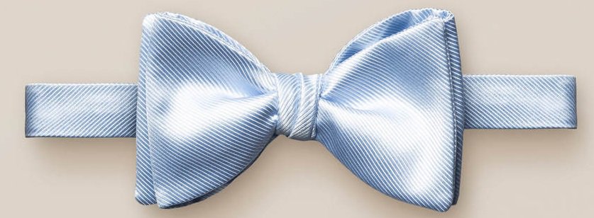 The Blue bow tie – self tied from Eton.