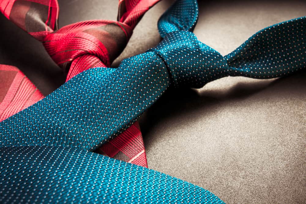 This is a close look at a couple of colorful and patterned ties.