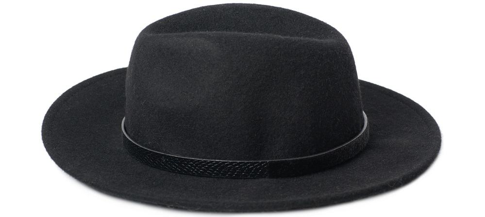 This is a close look at a pure black homburg hat.