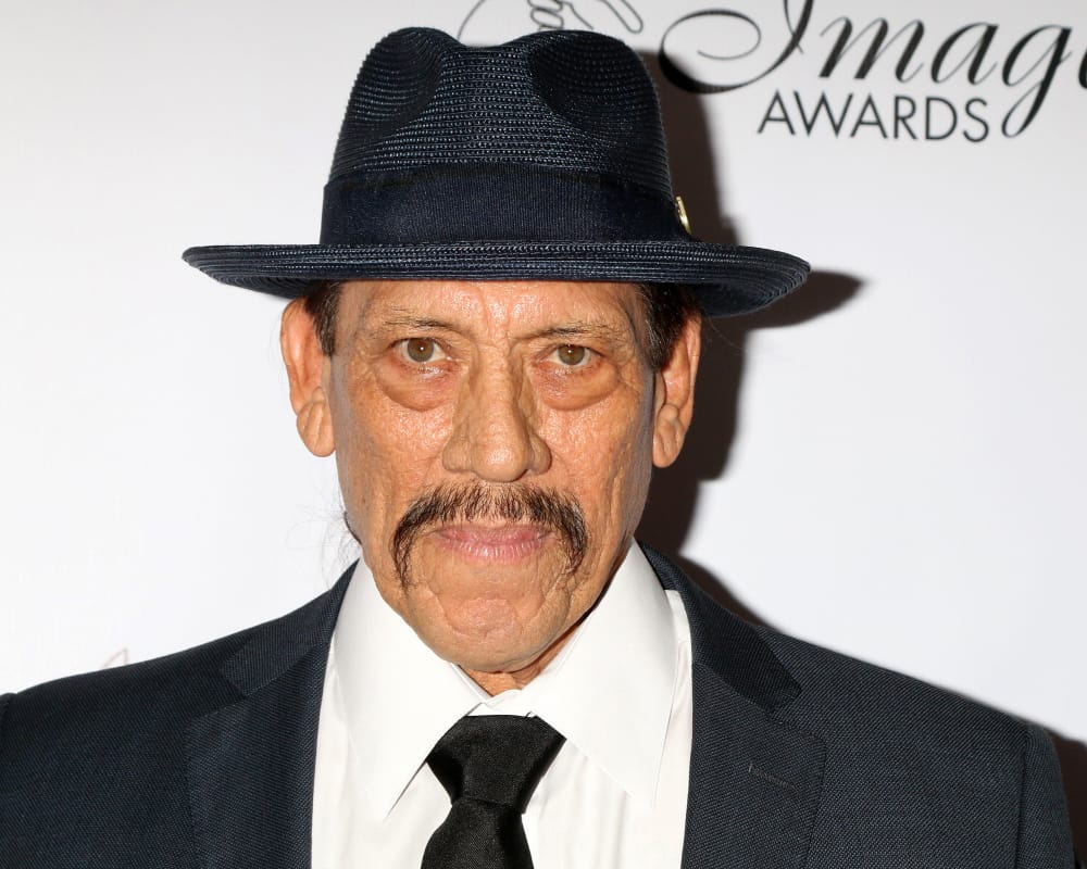 Danny Trejo attended the 2018 Imagen Awards wearing a fedora.
