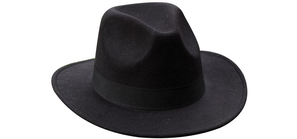 A close look at a black wide-brim fedora hat.