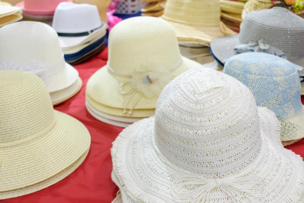 These are stacks of bonnet hats on display for sale.