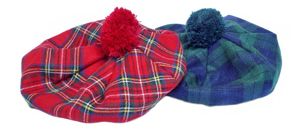 These are traditional Scottish tam caps in red and green patterns.
