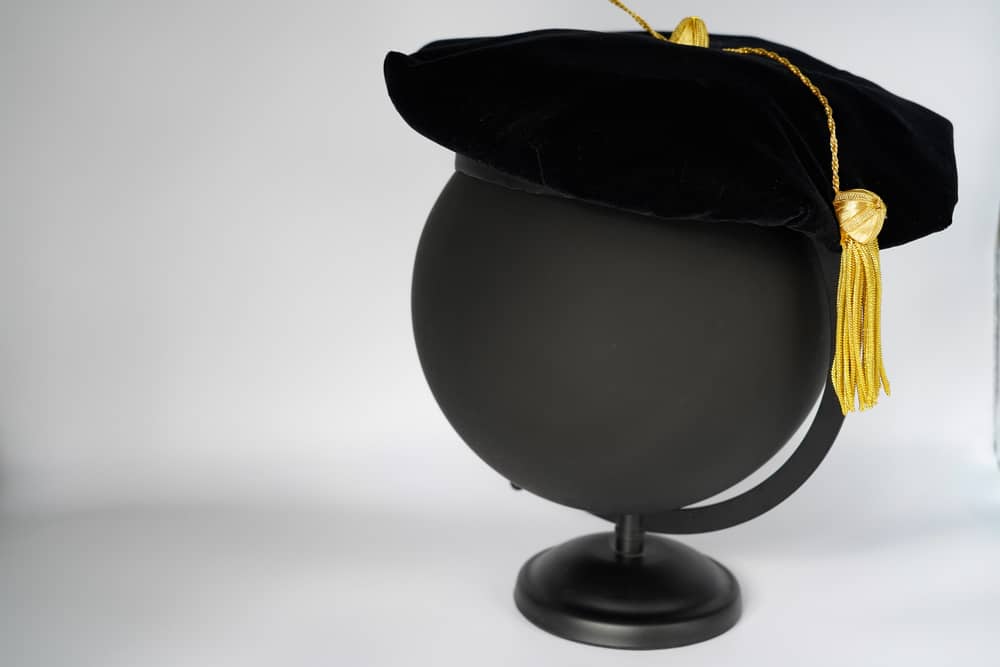 This is a black velvet doctorate tam cap with gold tassel.