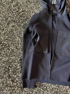 Pocket zipper on the Elgin Knit Hoody by Canada Goose